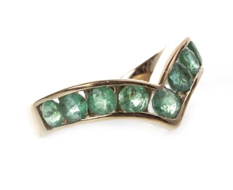 GREEN GEM SET WISHBONE RING, set with round faceted green gems, marked 9K, size O, 3.9g