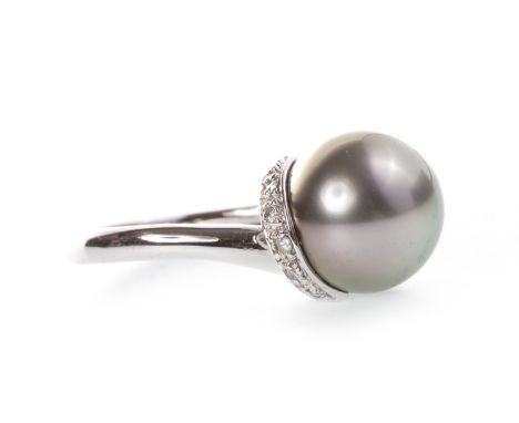 PEARL AND DIAMOND RING, set with a single grey pearl 10.5mm diameter on diamond shoulders, in nine carat white gold, size N, 