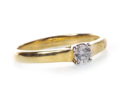 DIAMOND SOLITAIRE RING, set with a round brilliant cut diamond of approximately 0.20 carats, marked 750, size P 1/2, 4g