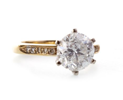 DIAMOND SOLITAIRE RING, set with a round brilliant cut diamond of approximately 2.10 carats, on diamond shoulders, unmarked, 