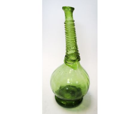A Beykoz or Persian green glass saddle flask, possibly 18th/19th century, the spiral trailed slender neck flaring to the ribb