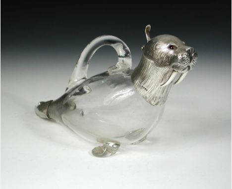 A Victorian silver mounted claret jug modelled as a walrus, by Henry William Curry, London 1883, the silver mounts forming th
