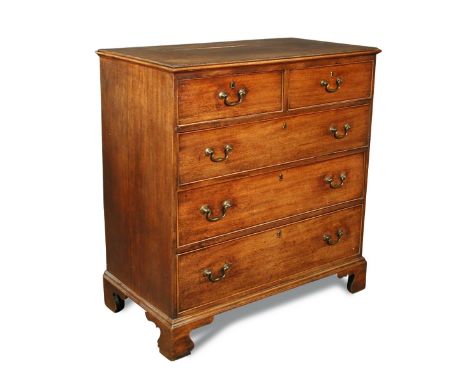 A George III mahogany chest of drawers, fitted two short and three long drawers, with brass swan-neck handles, on bracket fee
