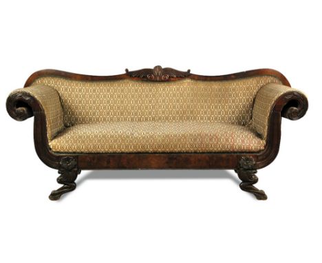 A William IV mahogany framed sofa, with lapit and leaf carved show wood, on large carved lion paw feet 100 x 235 x 73cm (39 x