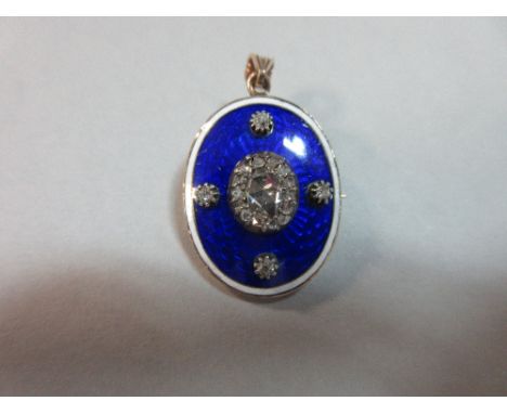 A 19th century diamond and enamel pendant / brooch, of oval lightly domed form with an oval rose cut diamond in a border of s