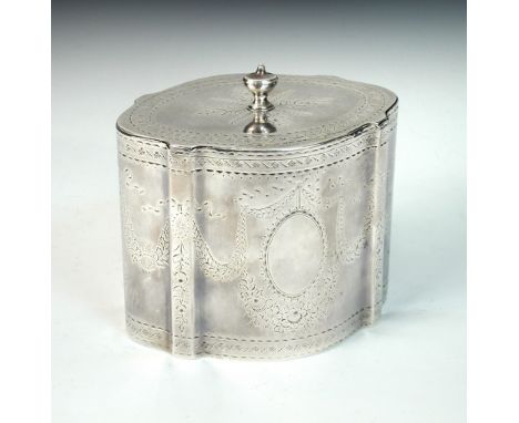 A George III silver tea-caddy, by Charles Aldridge and Henry Green, London 1784, of oval serpentine form, bright cut engraved