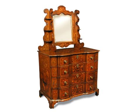 A Dutch floral marquetry dressing chest, 19th century, of en arbeleque outline, with urns and busts supporting floral spray t
