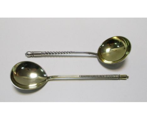 A Russian parcel gilt silver sauce ladle, maker's mark BM below eagle, assay master Aleksandr Timofeyevich Shevyakov, St Pete