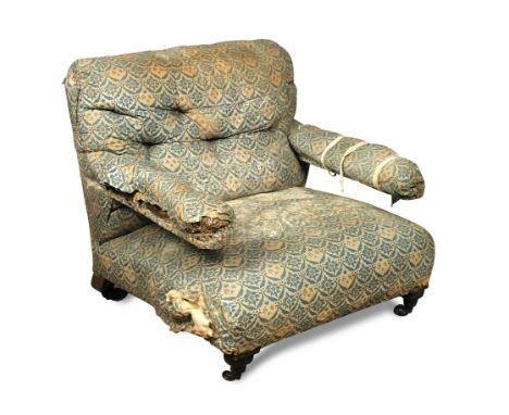 A Howard armchair, late 19th century, upholstered in original printed fabric, on turned front legs, stamped 266 - for restora