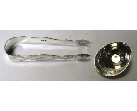 A George III silver jockey cap caddy spoon, maker IT, Birmingham 1798 with broad peak and bright cut decoration, 5cm, togethe