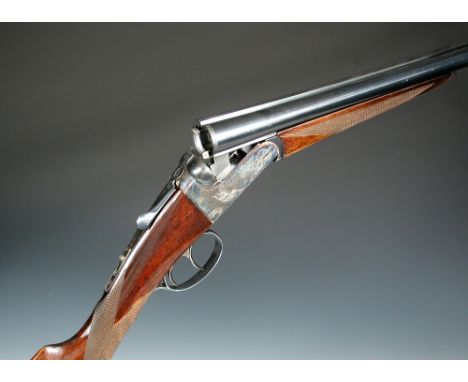 AYA, a model No.4 20 bore boxlock ejector gun, No. 418.95, with 27" barrels, the frame with border engraving and retaining mo