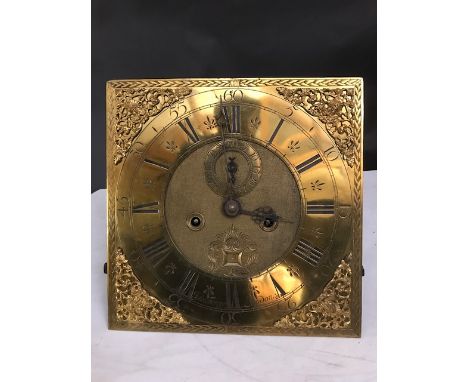 A George II oak longcase clock, the repolished case with caddy top hood having two brass ball finials above rectangular trunk