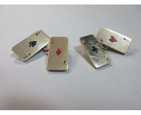 A pair of gold and enamel card players cufflinks, the double-ended links with long rectangular plaques depicting in red or bl
