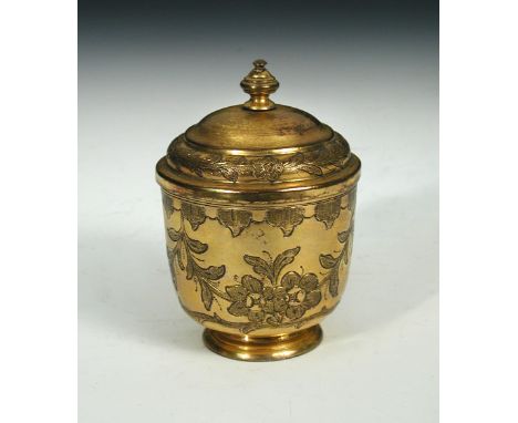 Constantinople 1845', an inscribed tombak sugar pot, the gilt copper engraved with flowers under gilding, the step domed hing