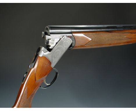 Bettinsoli, a 12 bore 'Top' model boxlock ejector gun, No. 74250, with ventilate 27 3/4" barrels, the frame with profuse bouq