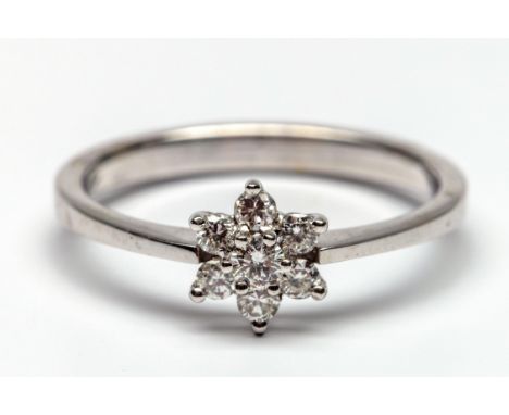 18 kt. Witgouden rozet ring,  bezet met briljant geslepen diamant met een totaalgewicht van ca. 0.20 ct. bruto 2,5 gr., ringm