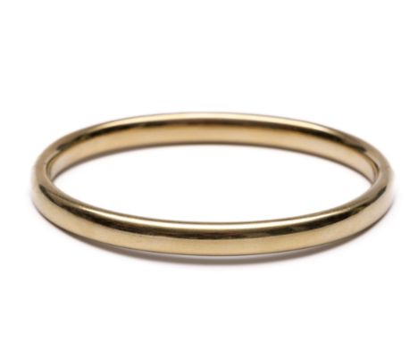14 kt. Gouden stijve armband netto 12,9 gr., b. 6,2mm, binnenmt. 59,5 x 52 mm  [1] 14 k. Gold rigid bracelet