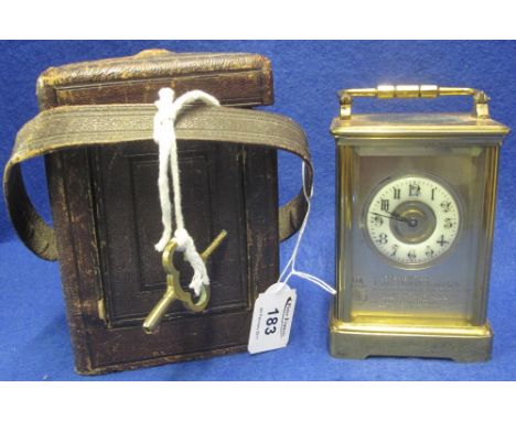 Large late 19th Century French brass carriage clock with presentation inscription: 'Presented to Captain David Laidlaw on the