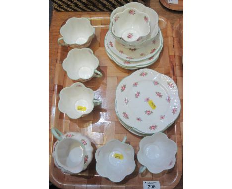 Tray of Shelley fine bone china 'Rosebud' design teaware, registration no. 13426, comprising: teacups and saucers; side plate