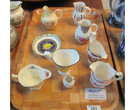 Tray of assorted modern Royal Worcester miniature jugs to include: chinoiserie; Nelson; Imari; blush ivory flat back 'Flight 