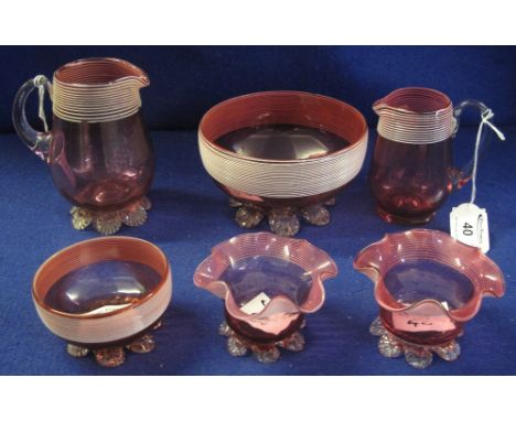 Group of assorted Victorian cranberry glass items, all having white enamel banding, comprising: cream jug and bowl; smaller, 