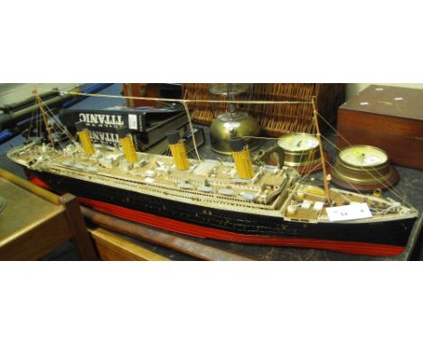 Hachett kit built, large scale, model of the liner 'Titanic', together with three volumes of descriptive magazines.