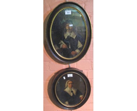 Pair of 17th Century style portrait studies depicting a Puritan gentleman and his wife, oils on copper, oval ebonised and gil