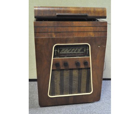 A vintage HMV gramophone, with Garrard deck, in a mahogany case with speaker to the front, 77cm x 52cm x 38cm