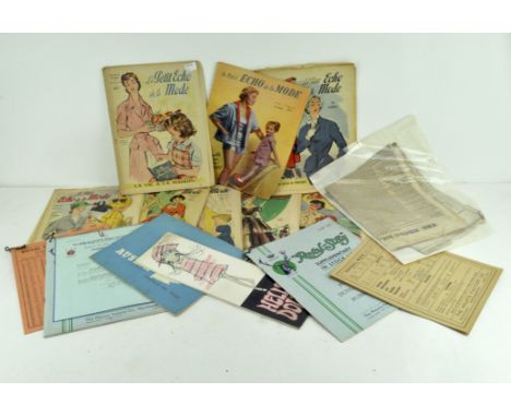 A group of vintage French Fashion magazines, including several copies of 'Le Petit Echo de la Mode' from the 1940-50s, a smal