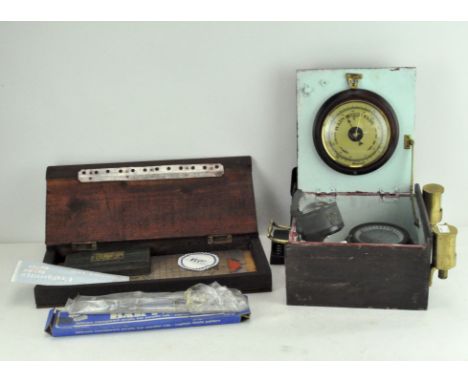 A barometer and WWII RAF compass in brass-mounted box, together with some navigation equipment, the compass marked Type P11, 