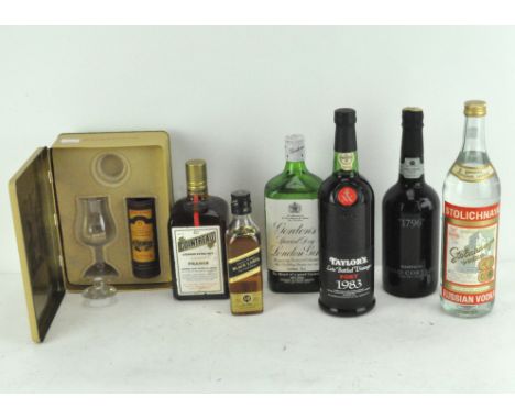 A collection of spirits, comprising: a miniature bottle of Glenmorangie 10 year old Scotch Whisky, 40%, Johnnie Walker, Black