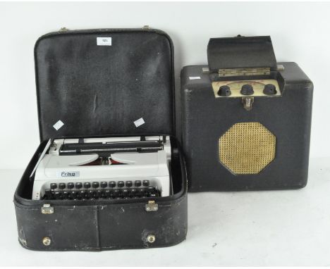 A vintage mid-century Roberts Radio, model 27708, together with a Robotron Mod 155 typewriter, cased