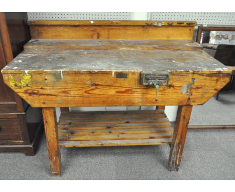 A vintage galleried work bench with Marples England vice, height of work top 87cm, x 138cm x 68cm