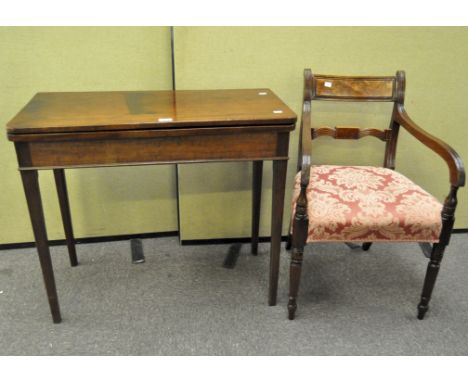 A Georgian mahogany folding card table and a Regency mahogany armchair, the card table inset with green baize, 74cm x 65.5cm 
