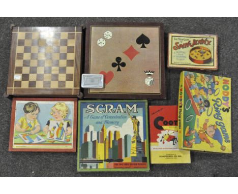 A collection of assorted vintage games, including: Spinning Jenny, Scram, Ring Game and a wooden chess set and others 