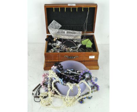 Assorted costume jewellery, to include chains, brooches, bangle and more, some in a jewellery box