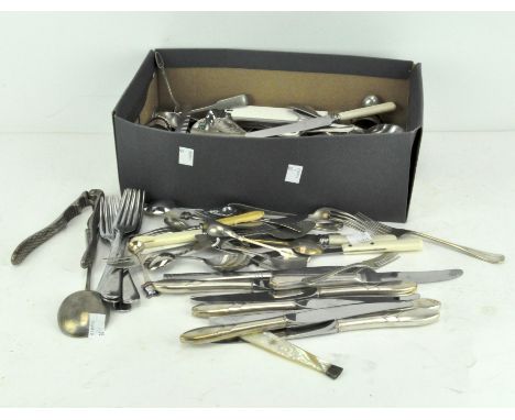 A collection of vintage silver plated and stainless steel flatware, tongs, napkin rings and other items, including bone and m