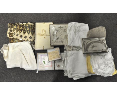 A collection of vintage linen, late Victorian/Edwardian and later, including boxed handkerchiefs, crochet and embroidered tab