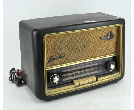 A vintage Bush radio, Type VHF61, mid-century, in brown bakelite case and with gold fronted speaker and dial 41 cm wide 