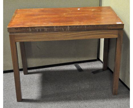 A 20th century mahogany fold out card table, opening to reveal a green baize, on squared legs, 70 cm x 91 cm x 51 cm