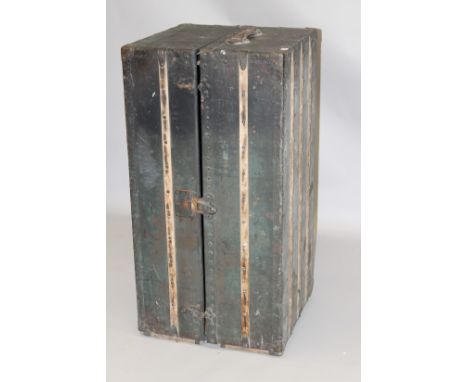 LOUIS VUITTON, A BRASS COVERED WARDROBE TRUNK with yellow leather cloth lined interior and chrome fittings, two small leather
