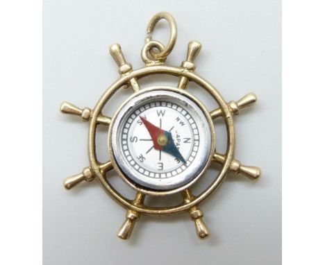 A 9ct gold nautical compass charm, 6.3g, 3cm