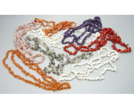 Seven 34" precious stone nugget necklaces including 148ct amethyst, red coral, 125ct Mexican fire opal, Australian white opal