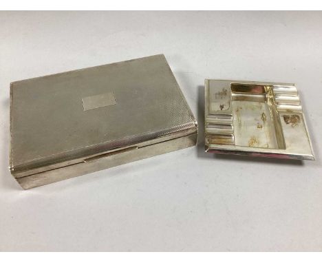 A Hallmarked Silver Cigarette Box, (marks rubbed), rectangular form, the hinged lid engine turned, 16.5cm wide; together with