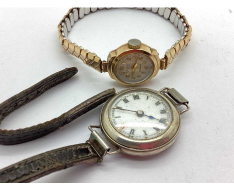 Summit 17 Jewels; A 9ct Gold Cased Ladies Wristwatch, the signed plain dial with Arabic numerals, to plain case, between an e