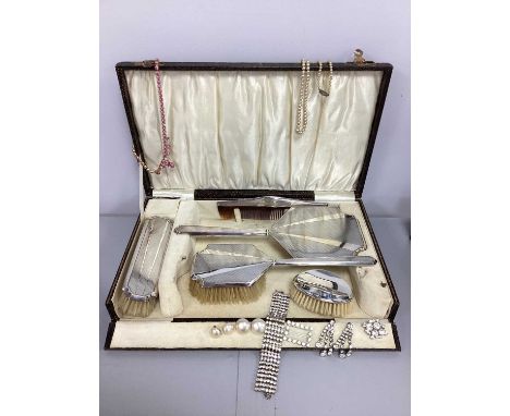 A Hallmarked Silver Backed Art Deco Dressing Table Set, comprising hand mirror, comb (damages), hair brush etc, Birmingham 19