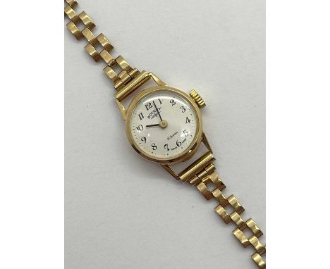 Rotary; A 9ct Gold Cased Ladies Wristwatch, the signed white dial with Arabic numerals and dot spacers, movement stamped "21 