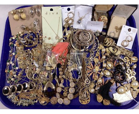 An Assortment of Gilt Coloured Costume Jewellery, to include imitation pearl clip on earrings, diamanté set necklace, stackin