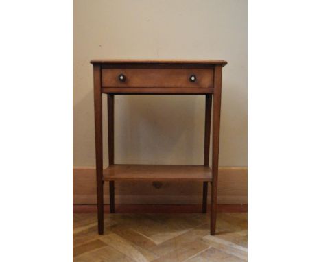 A C.1900 mahogany side table with ebony and ivory handled frieze drawer on square supports united by under tier. H.66 W.49 D.