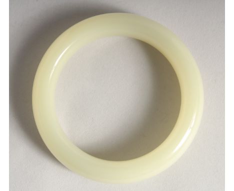 A CHINESE JADE BANGLE.